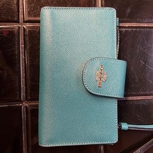 Coach wristlet with phone slot